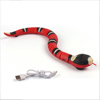 Red, black, and white electric induction snake toy for cats with a red tongue, next to a white USB charging cable. - Image 5