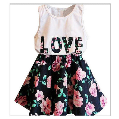 Conjunto de Dos Piezas para Niña: Chaleco Floral con Alfabeto y Falda Corta - Image 12