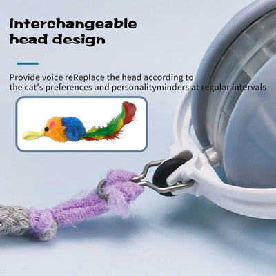 Light blue and white automatic rolling cat toy ball with a purple faux tail, featuring a power button. - Image 26
