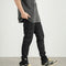 Calça Jeans Slim Fit com Corte Tridimensional e Bolsos Peito