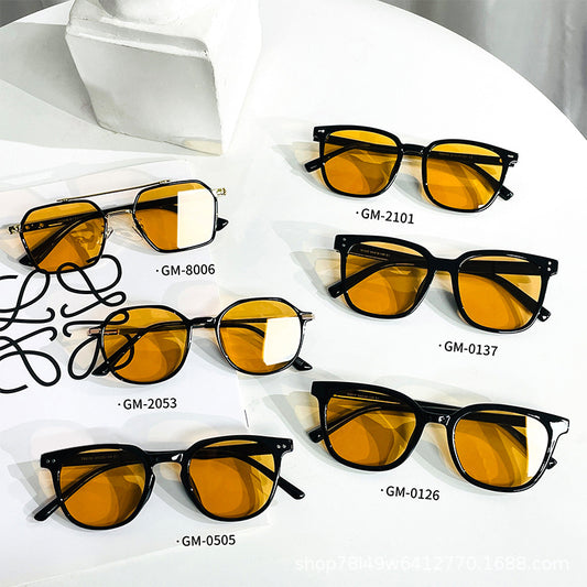 Black full-frame sunglasses with brown lenses, featuring a boxy style and visible dimensions. - Image 2