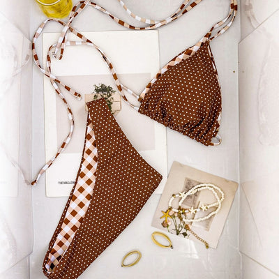 Retro brown and white plaid triangle bikini top with matching polka-dot bottoms, displayed flat with accessories. - Image 3