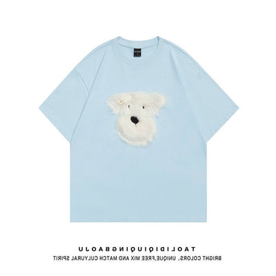 Black short sleeve t-shirt with a fluffy white puppy face embroidery, featuring a small gold barrette on its ear. - Image 5