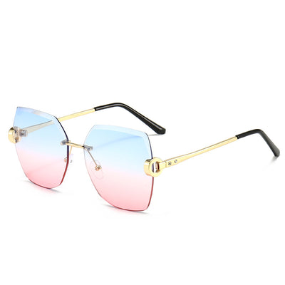 Woman wearing oversized hexagonal rimless sunglasses with gradient lenses and a black leather newsboy cap. - Image 11