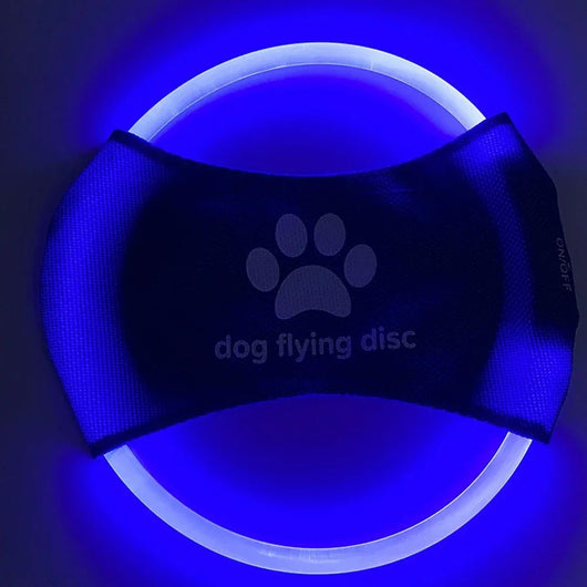 Red LED light-up dog flying disc with a white paw print logo and "dog flying disc" text. - Image 5