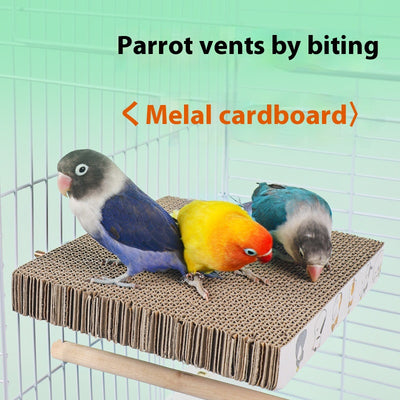Three colorful lovebirds on a rectangular corrugated cardboard platform with screws, attached to a white bird cage.