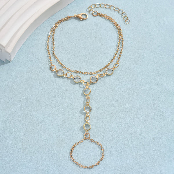 Gold-tone layered bracelet ring with clear crystal accents and a finger loop, featuring a lobster clasp closure. - Image 6