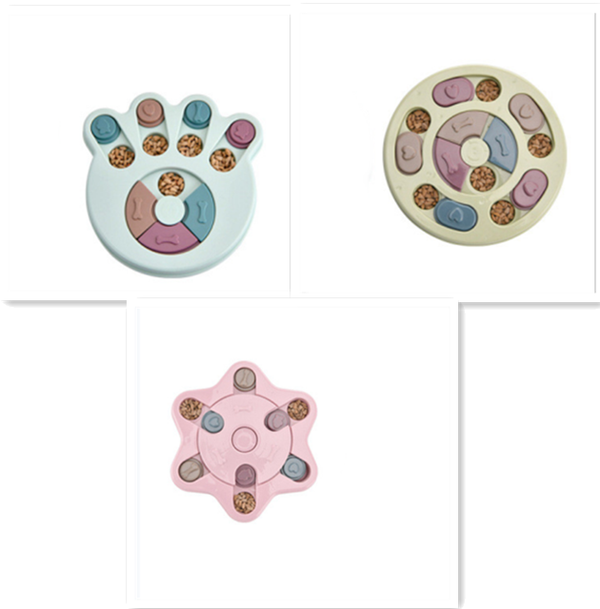 Paw-shaped dog puzzle feeder toy in light yellow with colorful sliding covers, filled with kibble. - Image 10