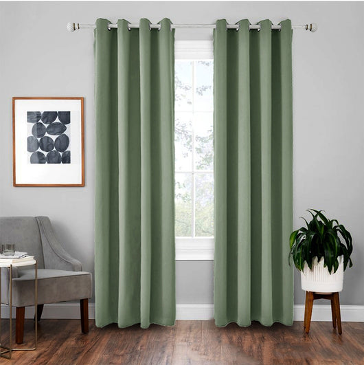 Light gray polyester blackout curtains with grommet tops hanging on a white rod in a modern living room. - Image 15