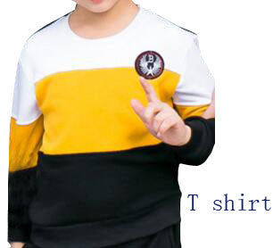 Men's white and yellow color block long-sleeve top with a crew neck and circular embroidered patch on the chest. - Image 6