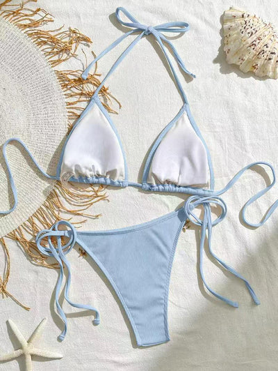 Light pink ribbed halterneck bikini with triangle cups and tie-side bottom, adorned with shell and starfish charms. - Image 23