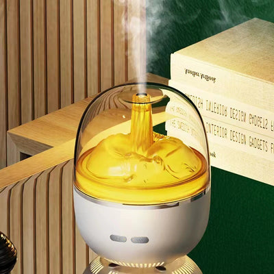 White essential oil diffuser and humidifier with a clear dome top, glowing red inside, and blue LED base light. - Image 5