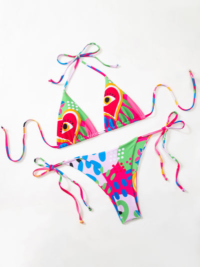 Women's vibrant abstract eye print bikini with triangle top and tie-side bottoms, featuring pink, green, and blue. - Image 11