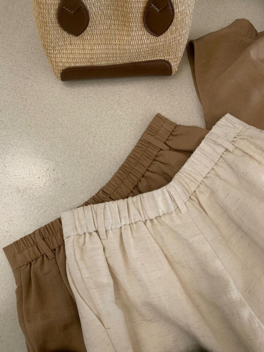 Conjunto Verano Elegante: Blusa sin Mangas Ceñida con Cordones y Pantalón Ancho de Cintura Alta - Image 11