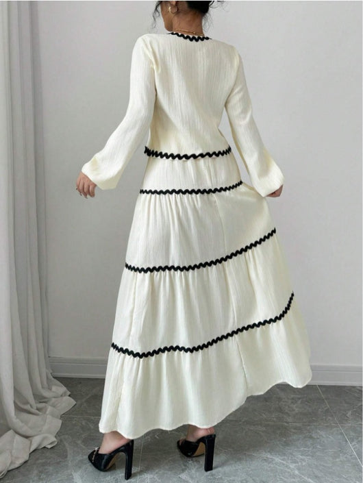 Conjunto Elegante con Blusa de Encaje y Falda Plisada con Mangas Farol - Image 22