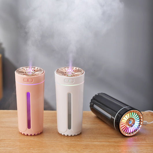 Pink cylindrical USB humidifier with a colorful light diffuser, control buttons, and a single fog outlet. - Image 4