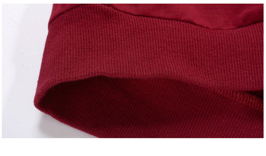 Family of four in matching maroon and striped outfits, including father, mother, son, and daughter. - Image 10