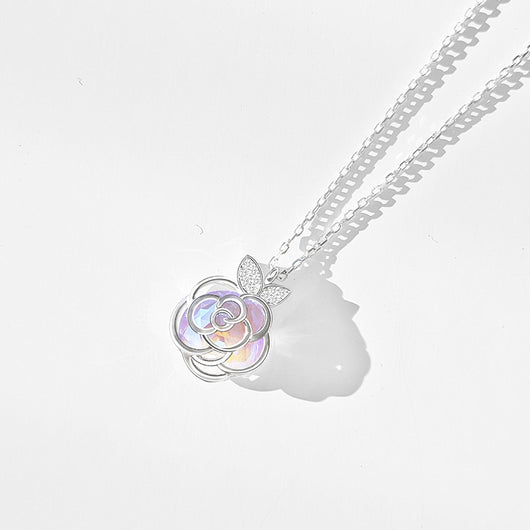 Gold-tone necklace with an iridescent camellia flower pendant and small clear stones on a delicate chain. - Image 6