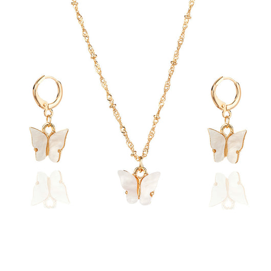 Pink acrylic butterfly necklace and earring set with gold-colored chain and hoop earrings. - Image 5