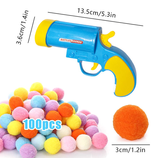 Pink pompom firing gun with a pile of colorful pompom balls and a cat playing with an orange ball. - Image 2