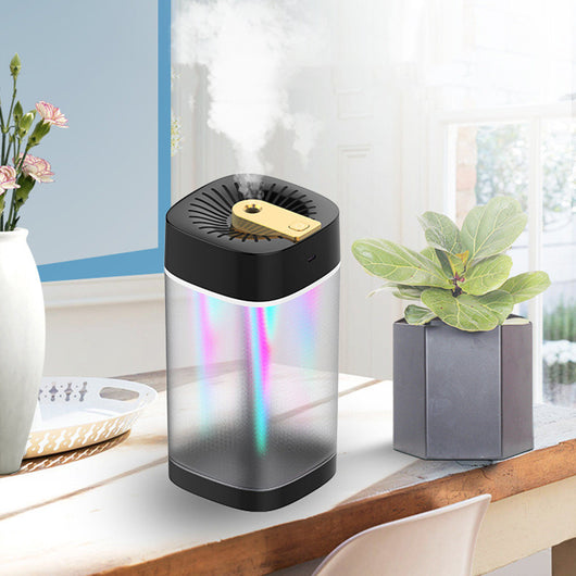 Modern cylindrical USB aroma humidifier with a metallic silver body, white top and base, and a gold mist outlet. - Image 9
