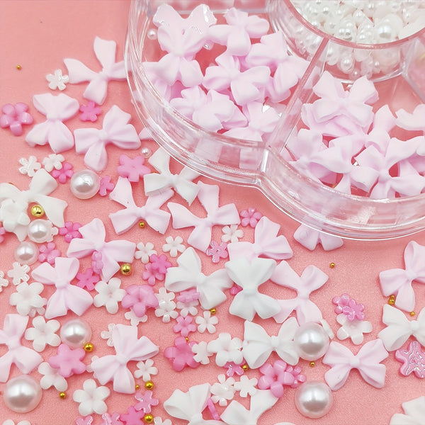 Adornos de Uñas de Resina Perla con Moño Mixto