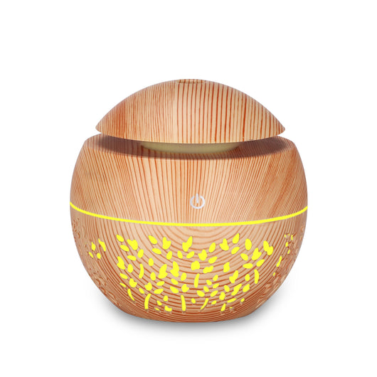 Dark wood grain mini ultrasonic humidifier with a mushroom shape and decorative hollow-out pattern. - Image 9