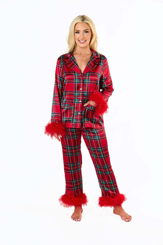 Young girl in a leopard print pajama set with black feather trim on the cuffs and ankles, wearing a pink glitter headband. - Image 32