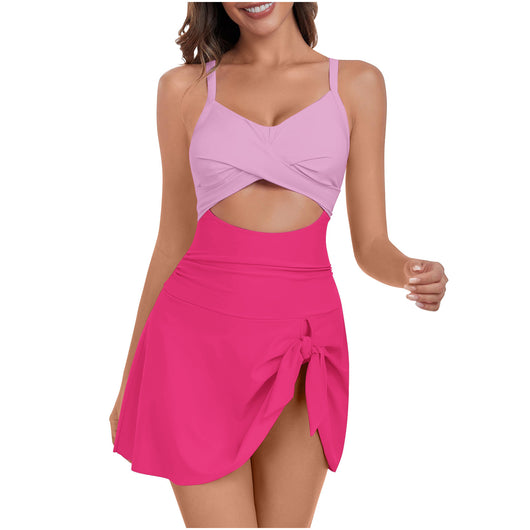 Women's black and white swimsuit dress with a criss-cross white top, midriff cutout, and a black skirted bottom with a side tie. - Image 11