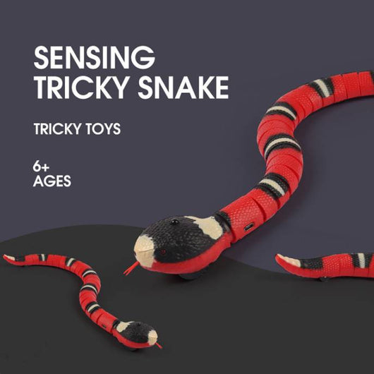 Red, black, and white electric induction snake toy for cats with a red tongue, next to a white USB charging cable.