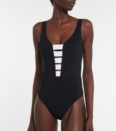 Black one-piece swimsuit with a deep V-neckline and white horizontal stitching detail across the plunge. - Image 23