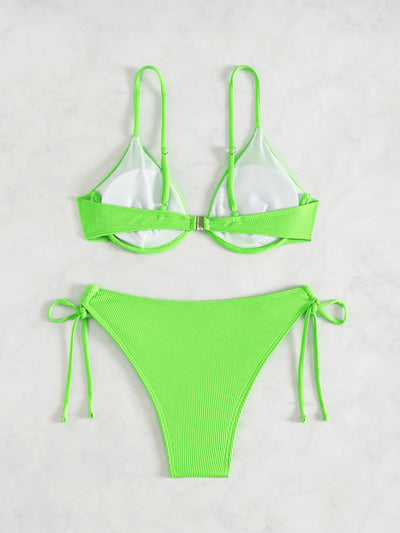 Black ribbed two-piece bikini with an underwire top and tie-side bottoms on a white marble surface. - Image 32
