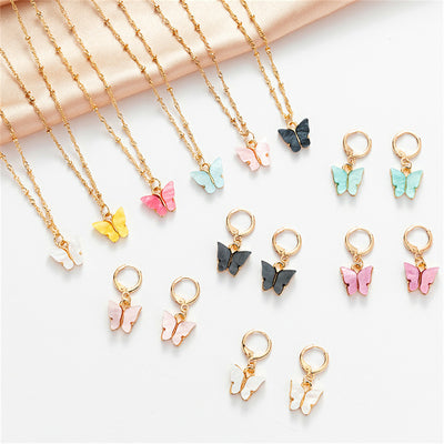 Pink acrylic butterfly necklace and earring set with gold-colored chain and hoop earrings. - Image 17