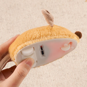 Interactive grey plush mouse cat toy with black ears and nose, feather and bell tail, and a USB charging cable. A kitten plays with a feather toy. - Image 3