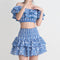 Conjunto de Playa Elegante: Blusa Corta con Cuello y Volantes + Falda Cintura Alta
