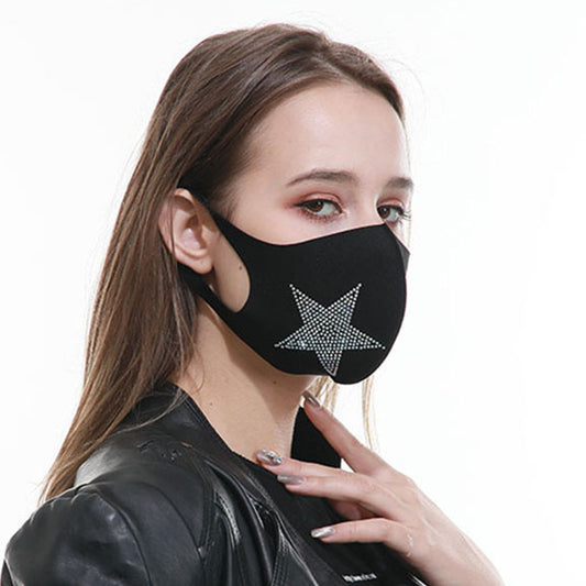 Black face mask with a sparkling rhinestone star design, modeled by a woman wearing a black leather jacket. - Image 2