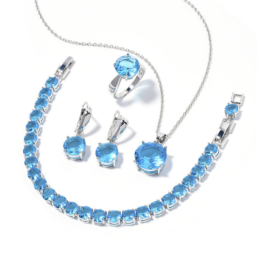 Four-piece jewelry set with silver-toned metal and round deep pink gemstones, including a necklace, bracelet, ring, and earrings. - Image 11
