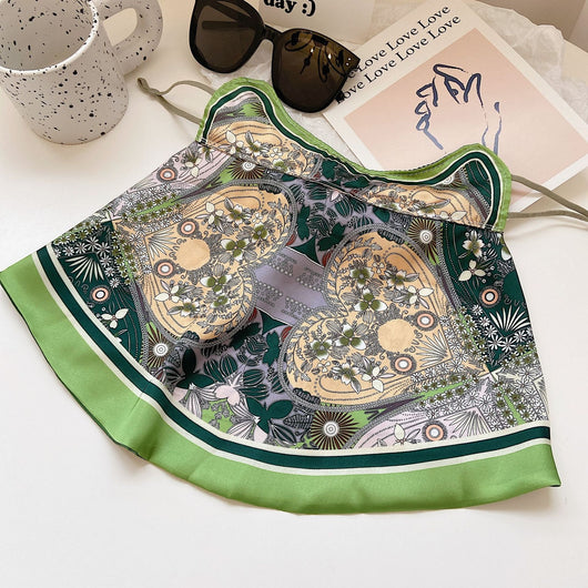 Female cream and black floral polka dot sun protection mask with ear loops, designed for eye corner protection. - Image 30