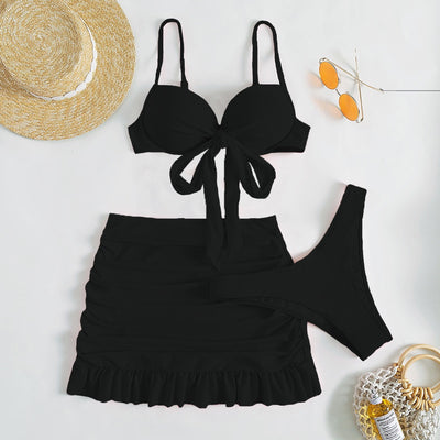Light blue three-piece women's swimsuit with a bow-front bikini top, ruched mini skirt, and matching bottoms. - Image 4