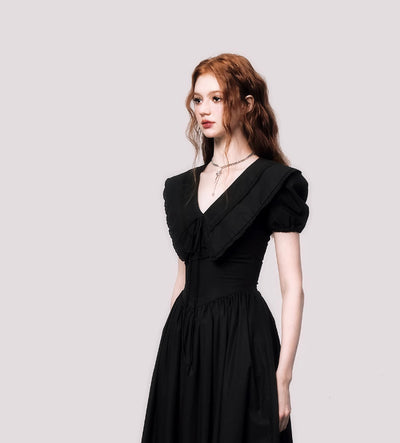 Vestido Negro Elegante con Cuello V y Mangas Abullonadas Estilo Francés - Image 4