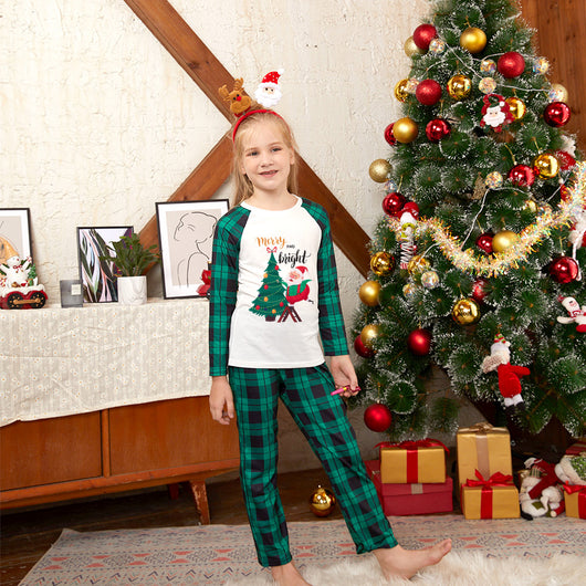 Men's Christmas pajama set with a white top featuring a Santa and Christmas tree graphic, and green plaid pants. - Image 4