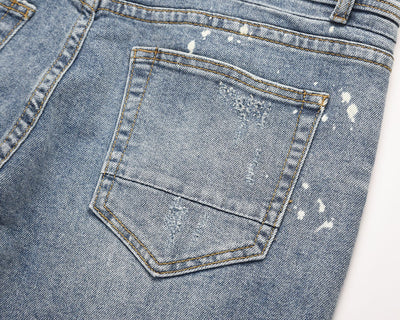 Jeans Azul Claro con Efecto Salpicado y Rotos Desgastados - Image 10