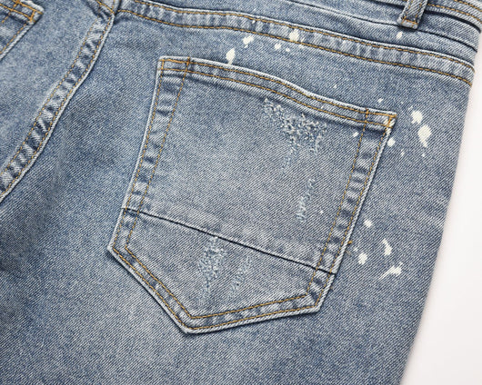 Jeans Azul Claro con Efecto Salpicado y Rotos Desgastados - Image 10