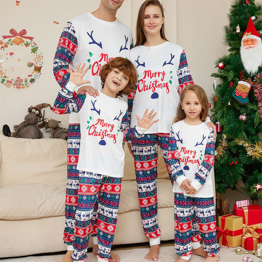 Family of four wearing matching white and red/blue Christmas pajamas with reindeer antlers and 'Merry Christmas' text. - Image 10