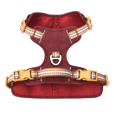 Brown leather pet harness with reflective stripes, adjustable tan buckles, and a gold D-ring on a white background. - Image 8