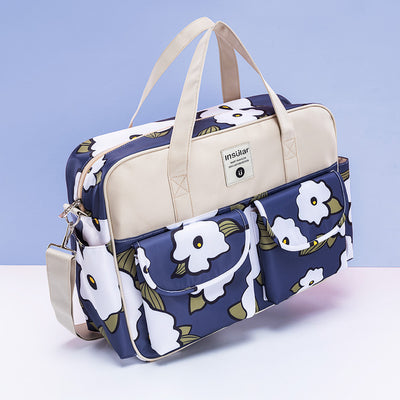 Bolso Maternal Bandolera Elegante con Diseño Asimétrico - Image 16