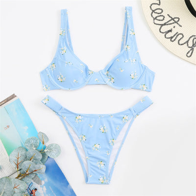 Light blue floral bikini with pink and yellow flowers, featuring an underwire top and high-cut bottom. - Image 4