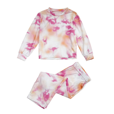Woman wearing a pink and white tie-dye long-sleeve top and matching pants set, posing casually. - Image 14