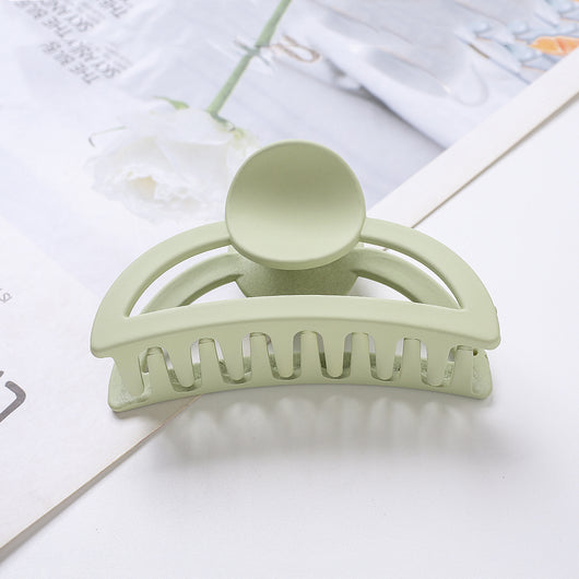 Frosted light blue rectangular hair claw clip with a gold-toned spring mechanism, ideal for securing hair. - Image 5