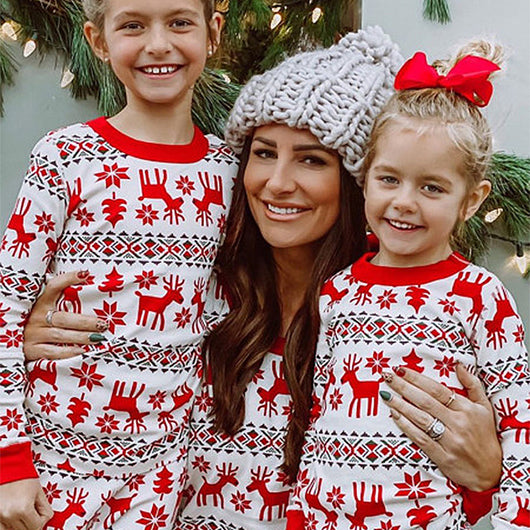 Mother and two daughters in matching red and white elk print long-sleeve pajamas, perfect for holiday family photos. - Image 2